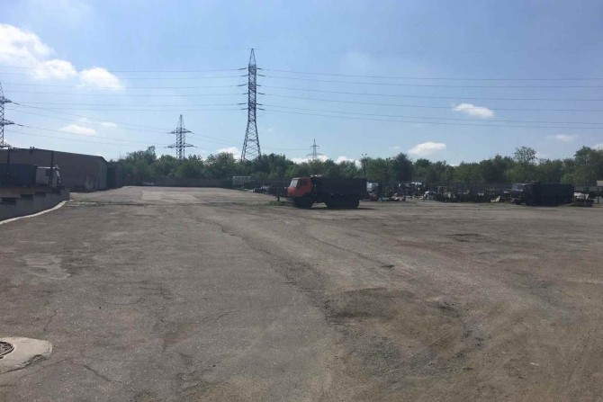 Сдам асфальтируемый участок под охраной ж/м.Западный. - изображение 1