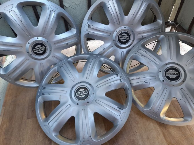 Ковпаки до ряду авто Nissan R 15 - изображение 1